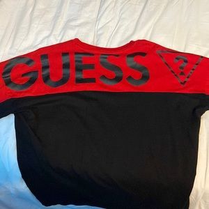 This is a red guess t-shirt size large